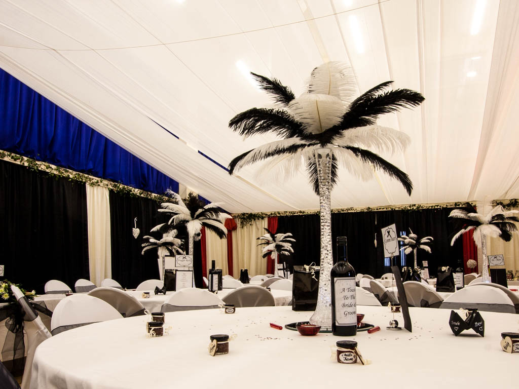 Black and Cream Drapes with Red Flashes Hall Chairs hired tables and chair covers